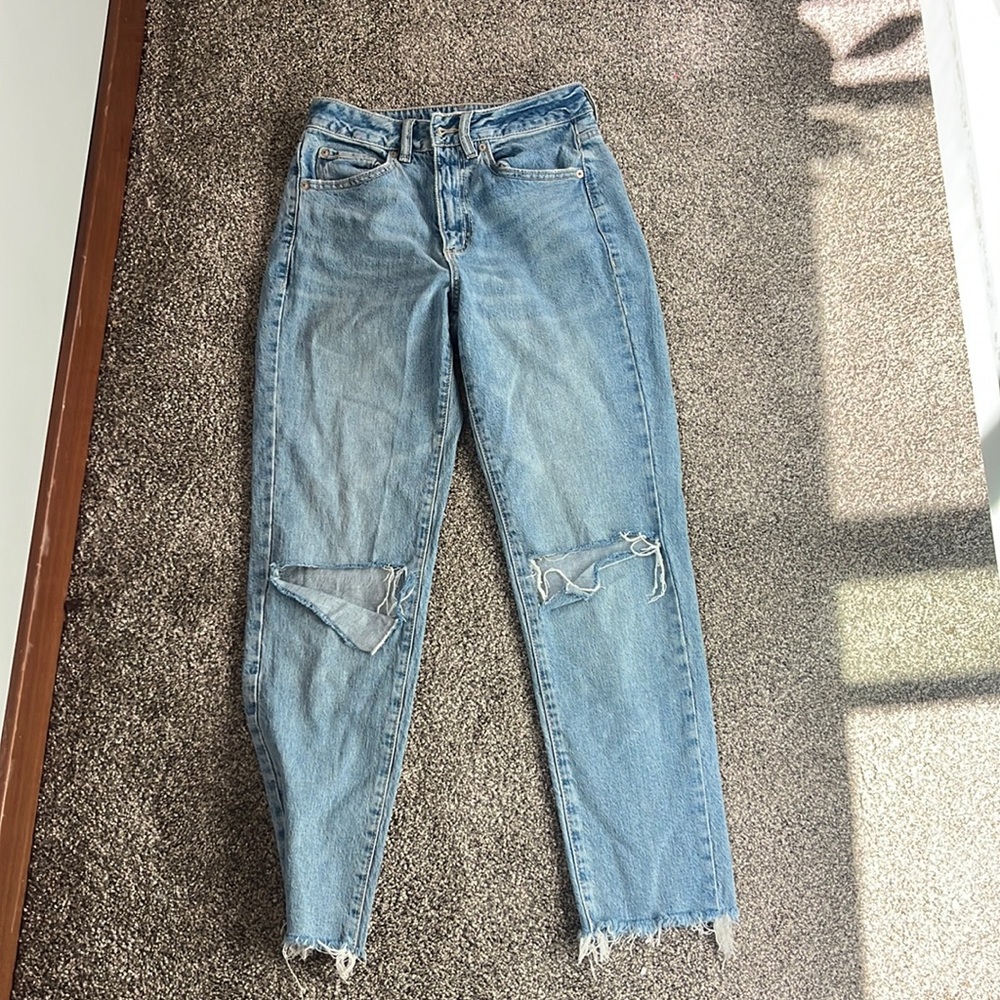 Medium Wash, Lightly Ripped Garage Jeans.